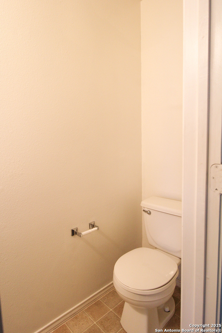 20823 Blue Trinity San Antonio, TX 78259 - Photo 15 of 46 a bathroom with a toilet