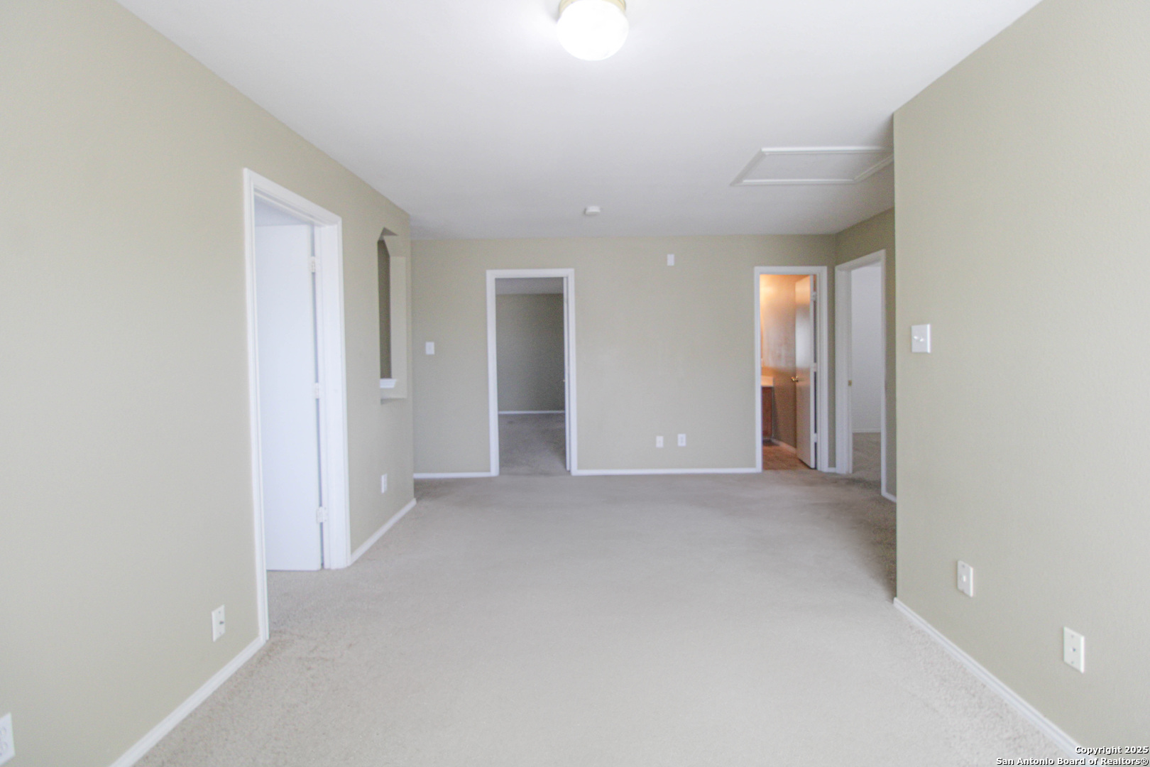 20823 Blue Trinity San Antonio, TX 78259 - Photo 27 of 46 an empty room with windows and bathroom view