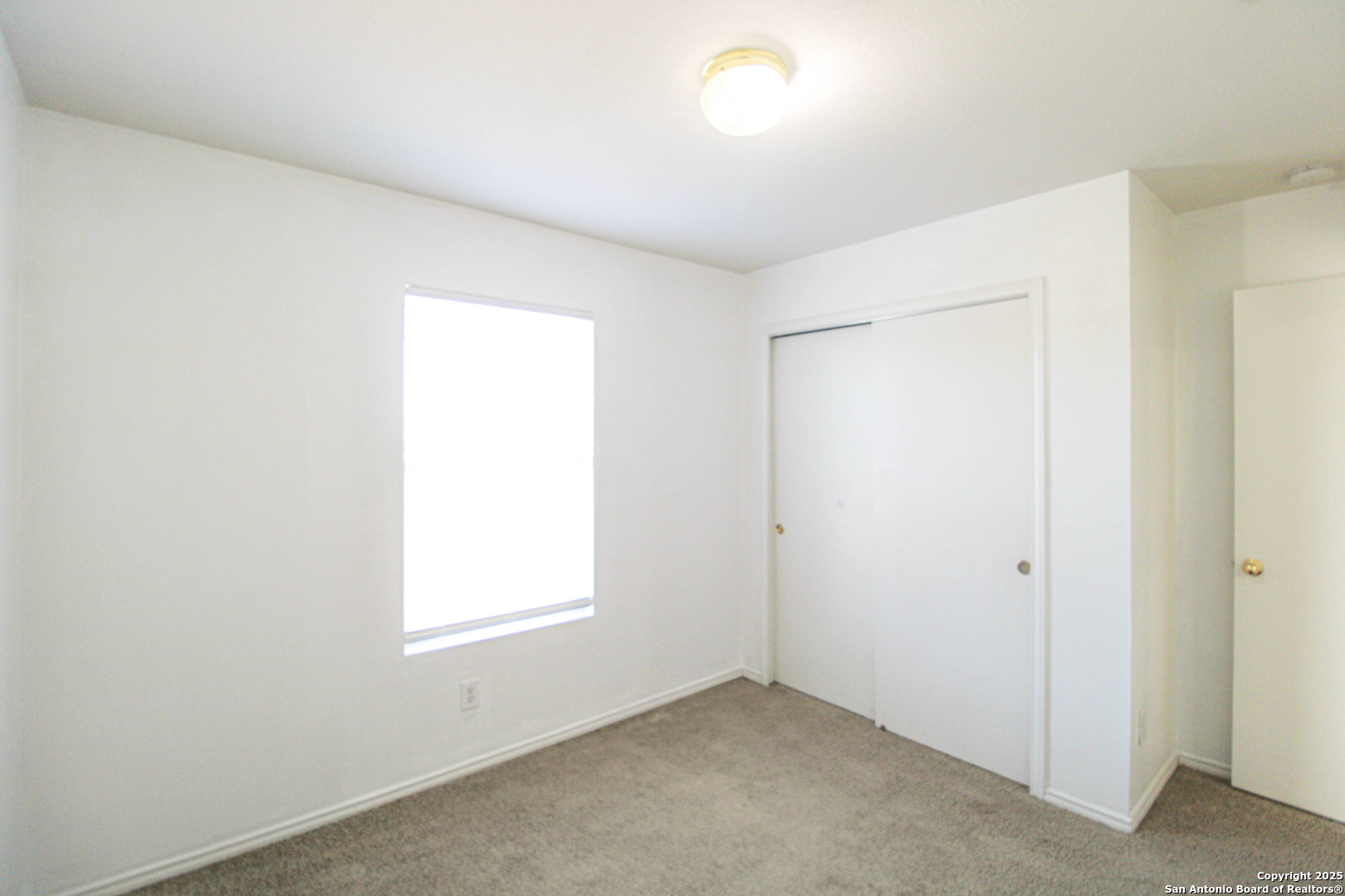 20823 Blue Trinity San Antonio, TX 78259 - Photo 30 of 46 an empty room with a window