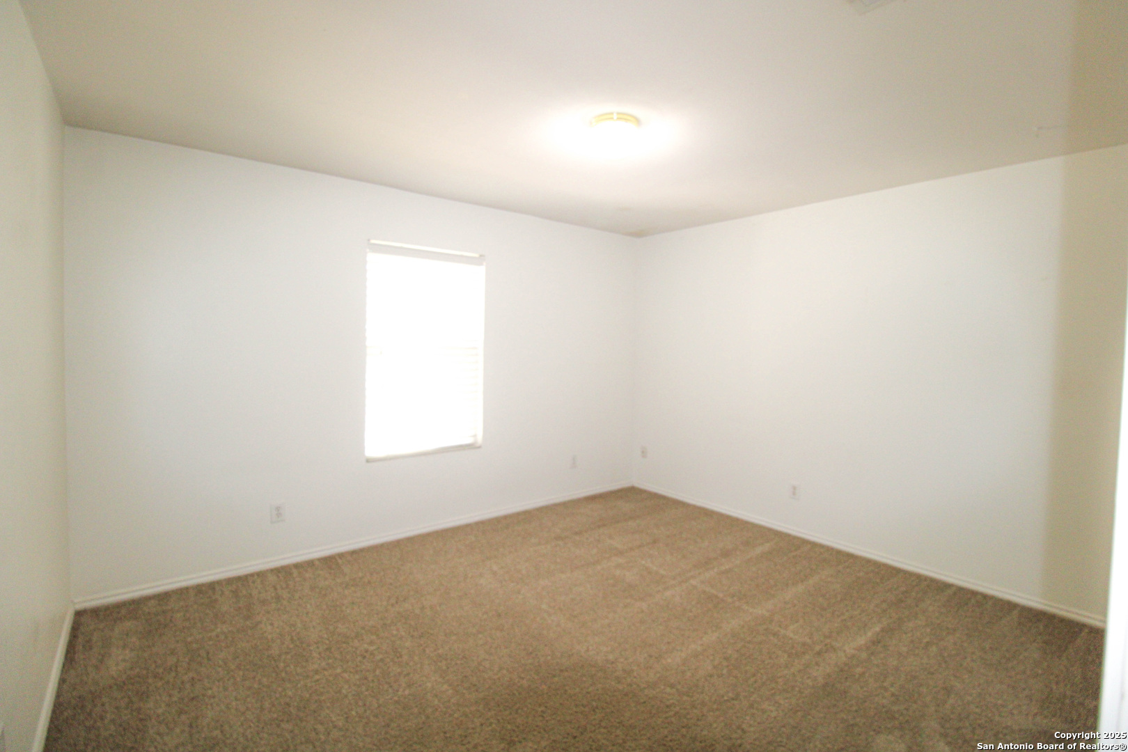 20823 Blue Trinity San Antonio, TX 78259 - Photo 33 of 46 an empty room with a window