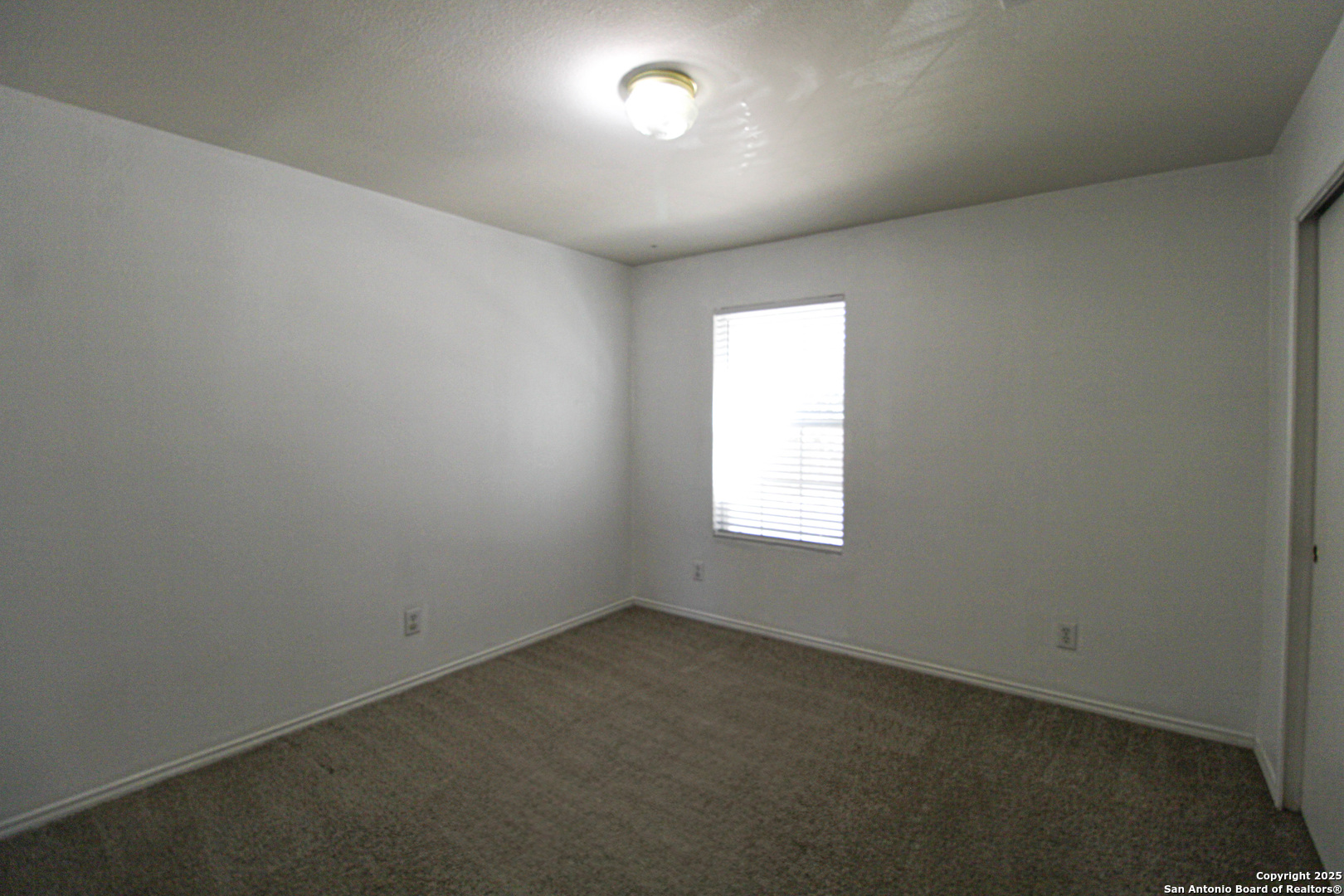 20823 Blue Trinity San Antonio, TX 78259 - Photo 38 of 46 an empty room with a empty space and windows