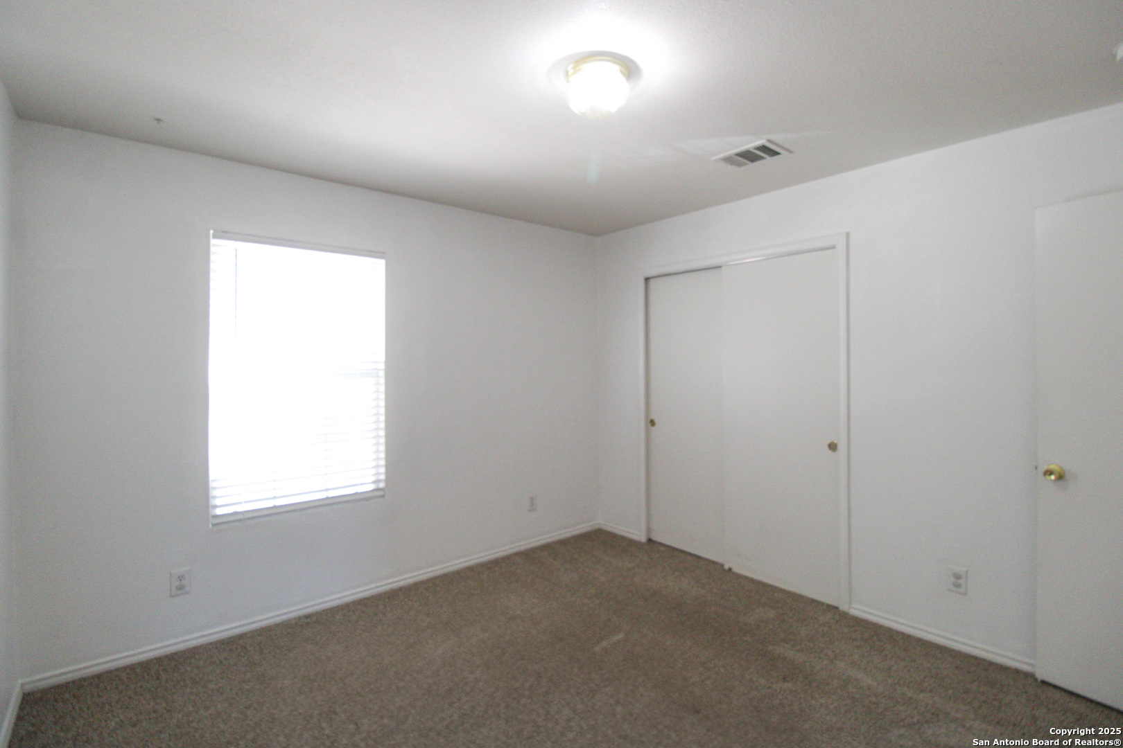 20823 Blue Trinity San Antonio, TX 78259 - Photo 39 of 46 an empty room with a window