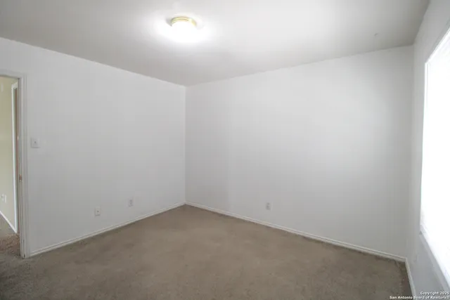 a bathroom with a tub and a sink