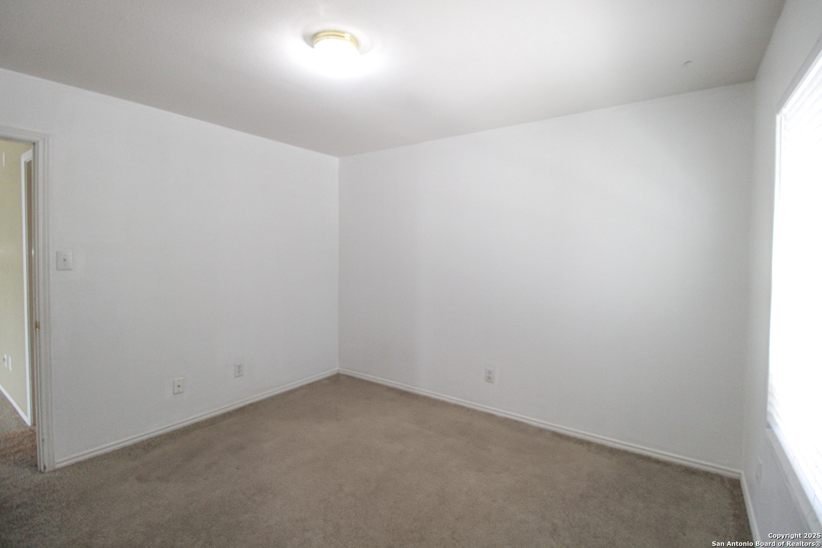 20823 Blue Trinity San Antonio, TX 78259 - Photo 41 of 46 an empty room with a window