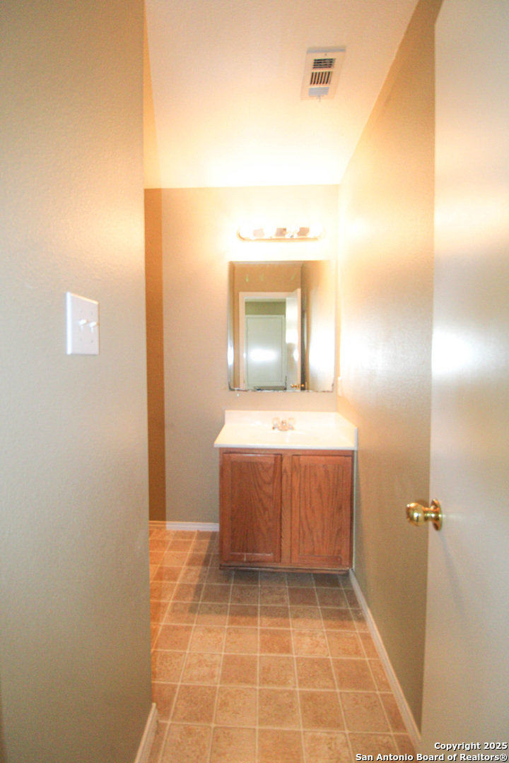 20823 Blue Trinity San Antonio, TX 78259 - Photo 42 of 46 a bathroom with a tub and a sink