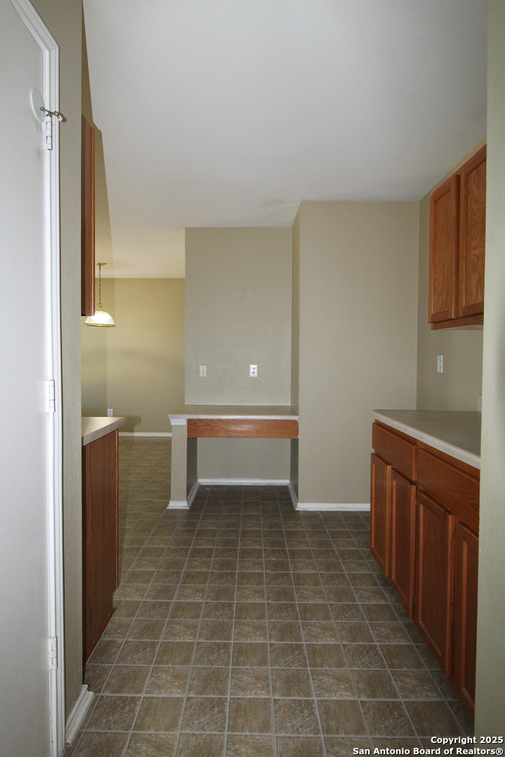 20823 Blue Trinity San Antonio, TX 78259 - Photo 10 of 46 a bathroom with a sink a toilet and a shower