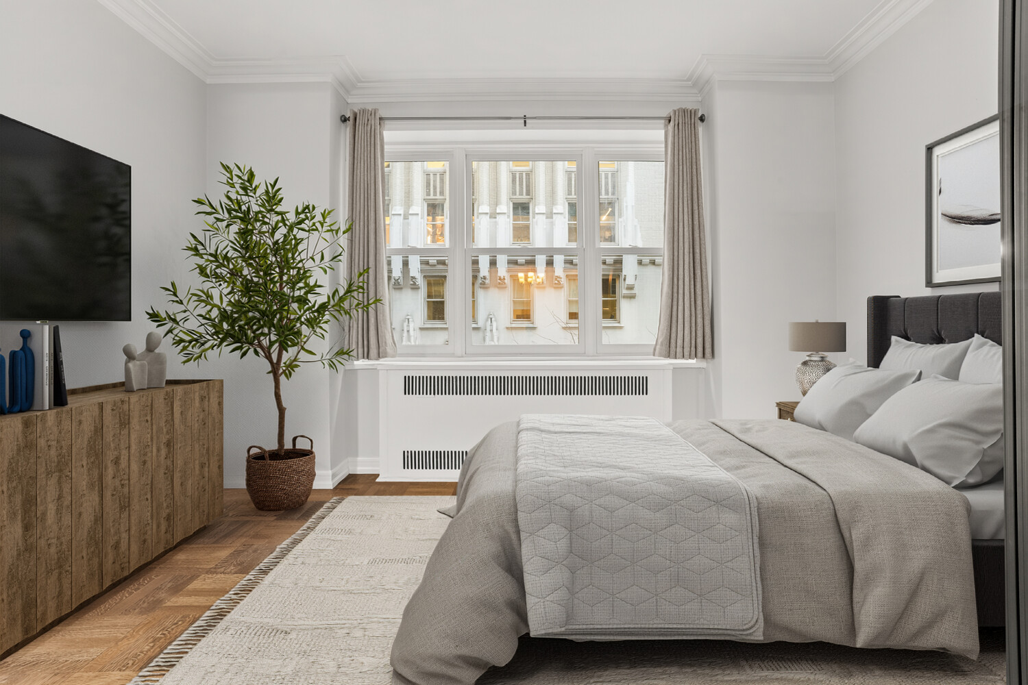 220 Madison Avenue, Unit 3M Manhattan, NY 10016 - Photo 6 of 11 a bedroom with a bed and a potted plant