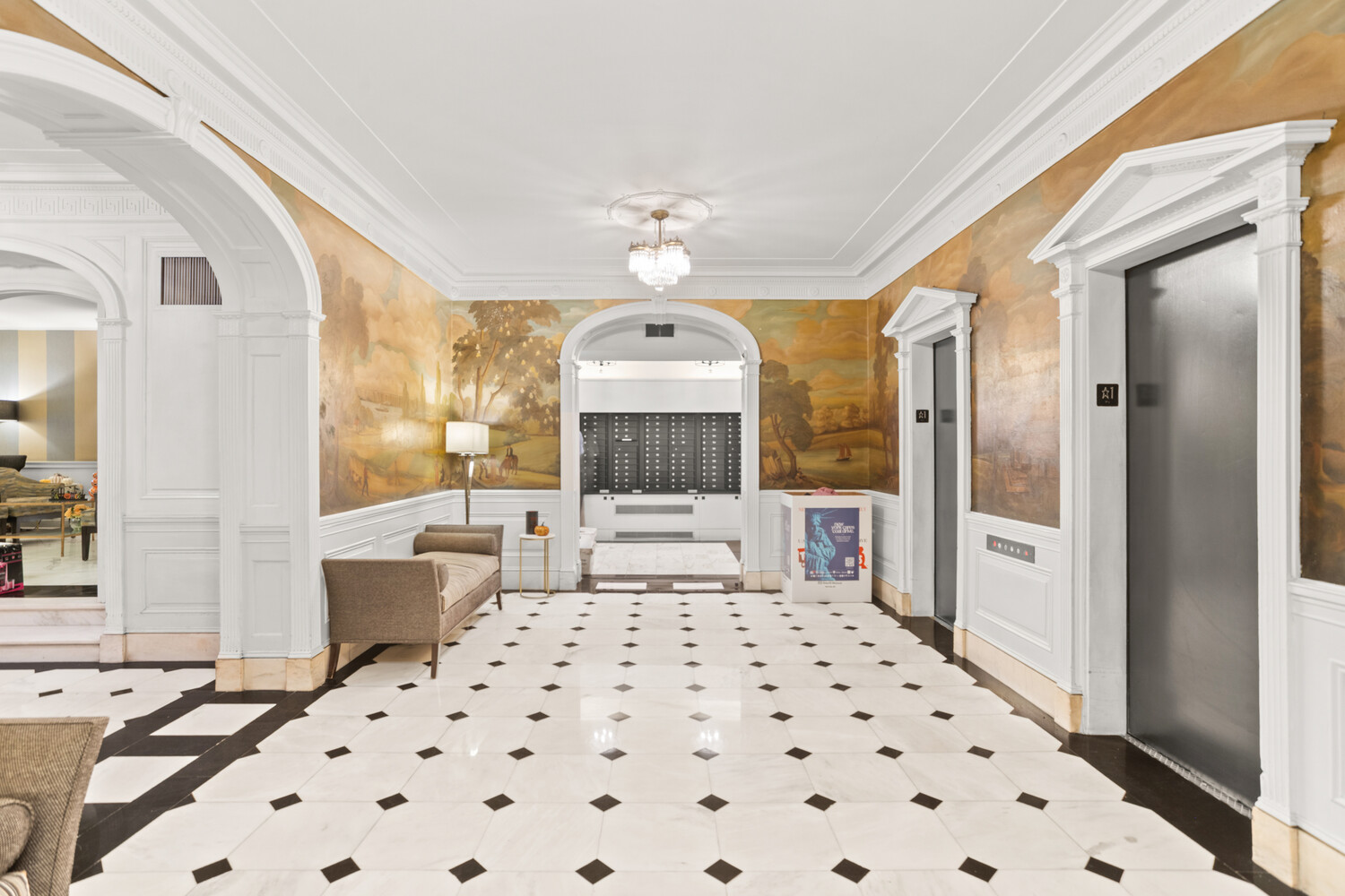 220 Madison Avenue, Unit 3M Manhattan, NY 10016 - Photo 8 of 11 a spacious bedroom with a bed and a chandelier