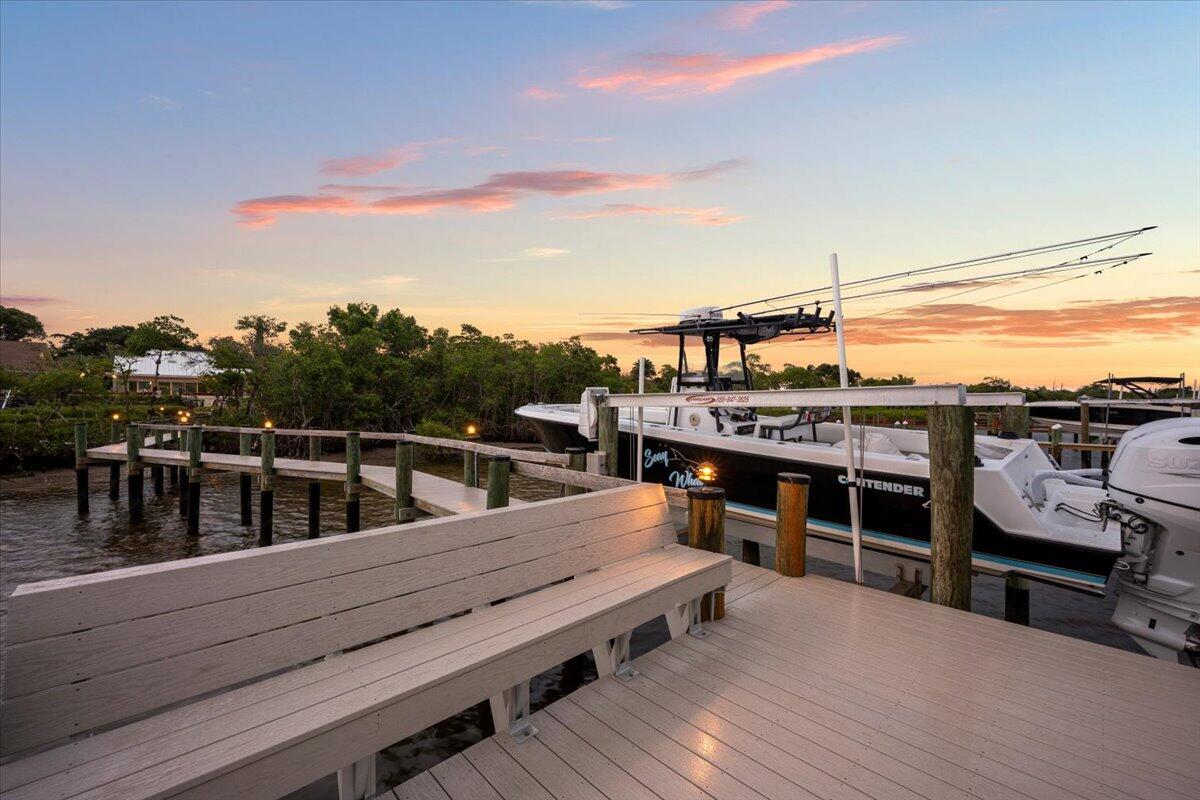 352 River Edge Road Jupiter, FL 33477 - Photo 51 of 56 a view of a balcony with wooden floor and city view