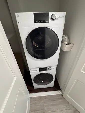 a utility room with dryer and washer