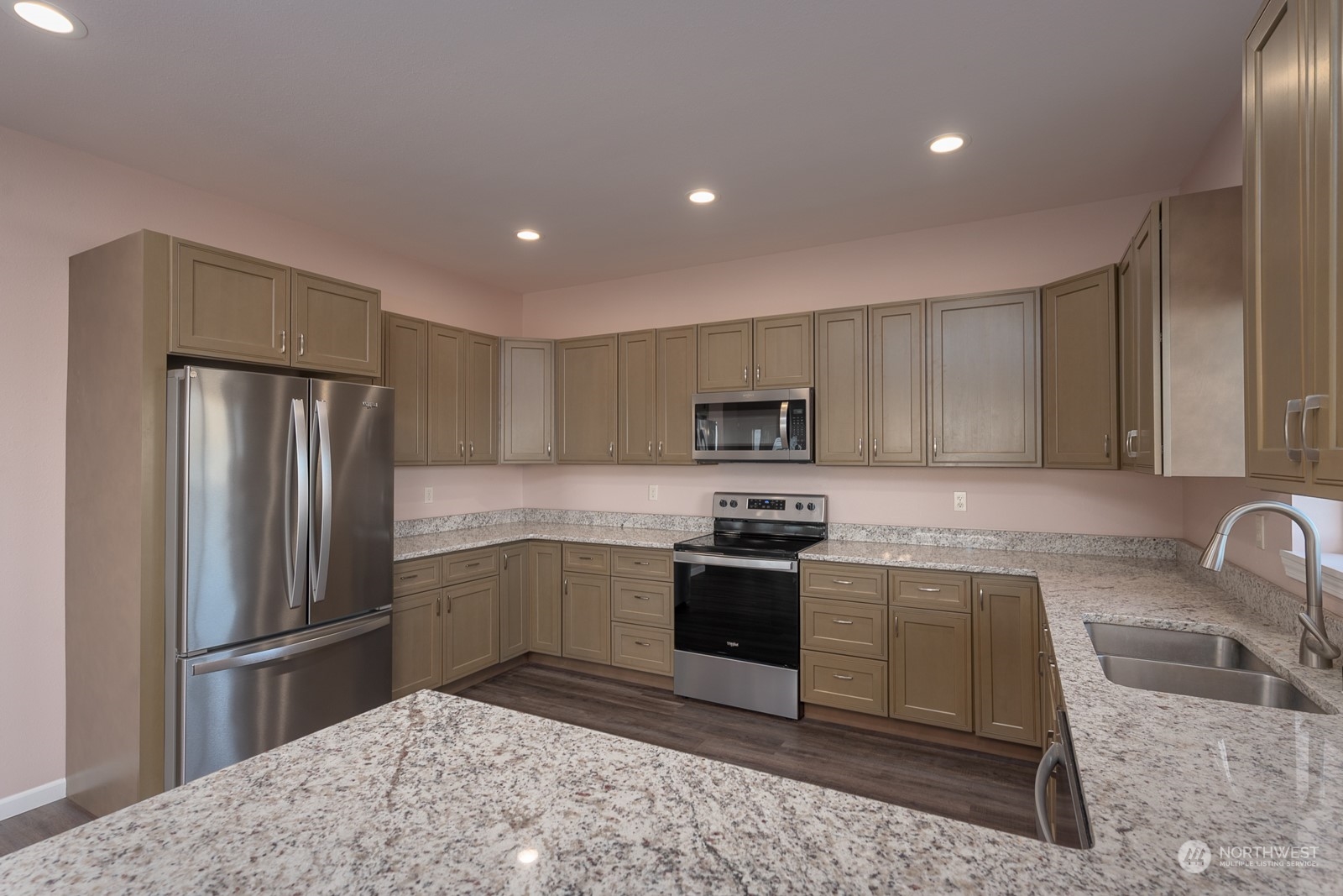 481 Patrick Road Ephrata, WA 98823 - Photo 11 of 39 a kitchen with stainless steel appliances granite countertop a refrigerator sink and stove