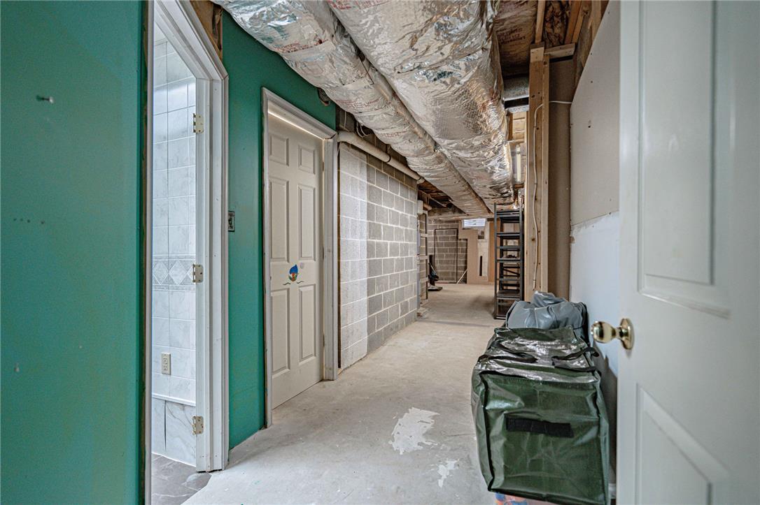 652 Old State Road Oley, PA 19547 - Photo 40 of 54 Unfinished basement space offers ample storage and potential for future customization.