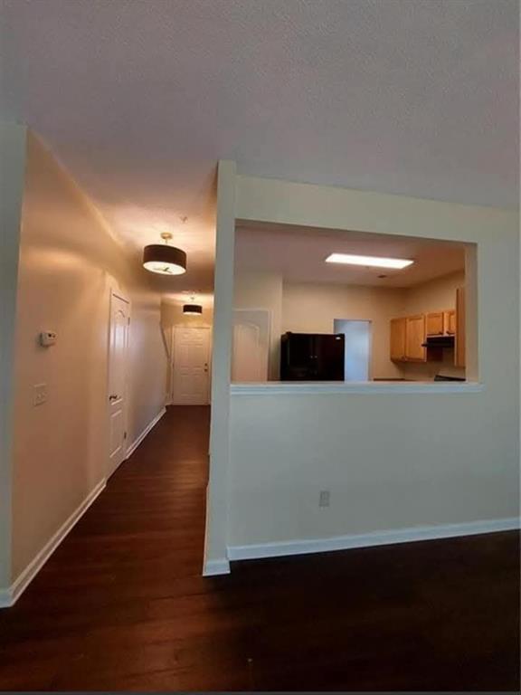 1749 Broad River Road Atlanta, GA 30349 - Photo 5 of 10 a view of a livingroom with wooden floor