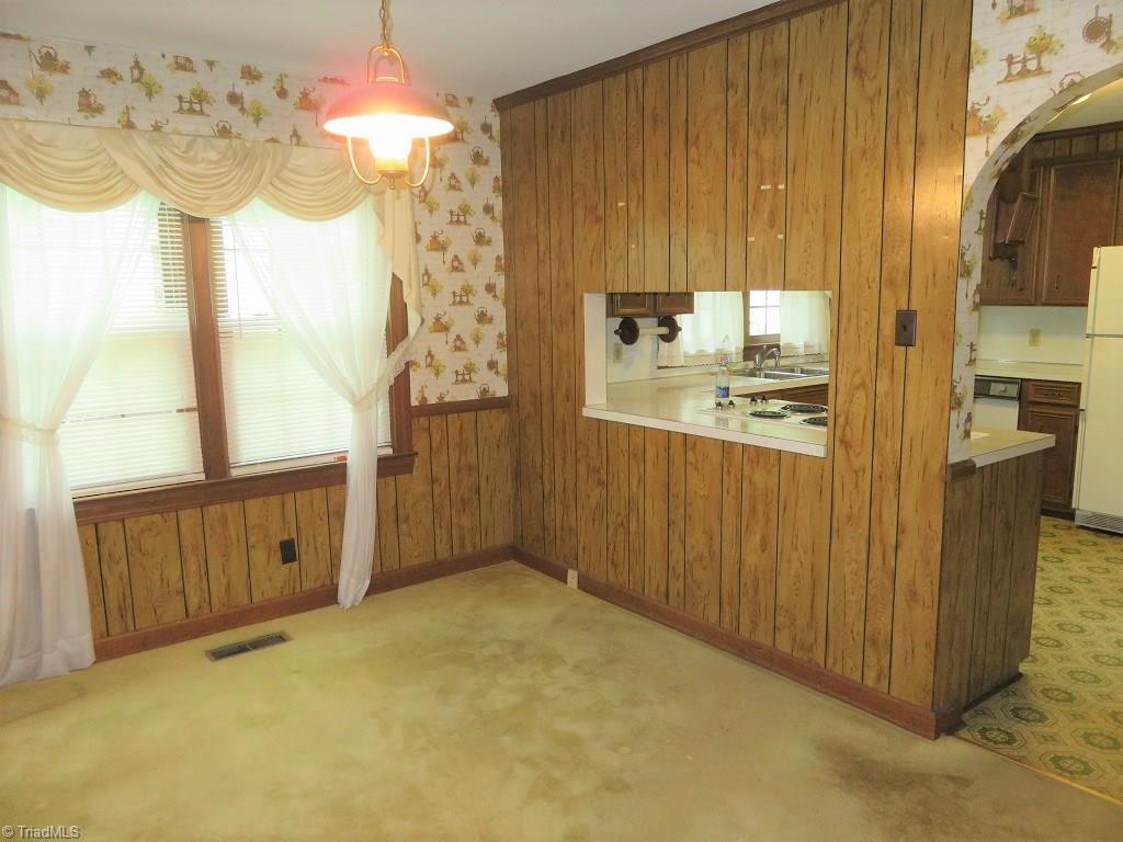 4744 Germanton Road Winston-Salem, NC 27105 - Photo 5 of 25 Formal dining opens to spacious kitchen