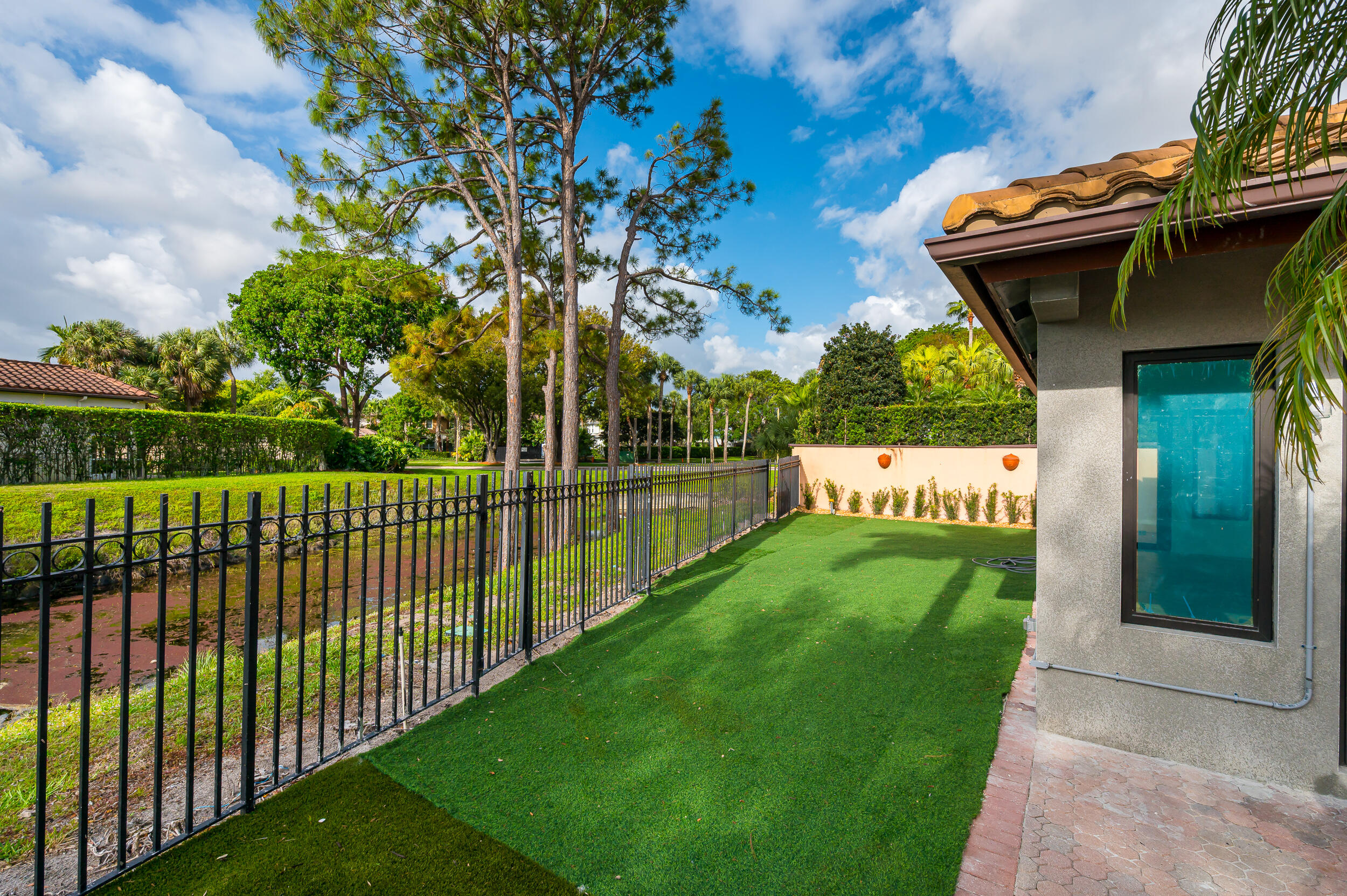 6388 Via Rosa Boca Raton, FL 33433 - Photo 47 of 49 a view of a garden from a corridor