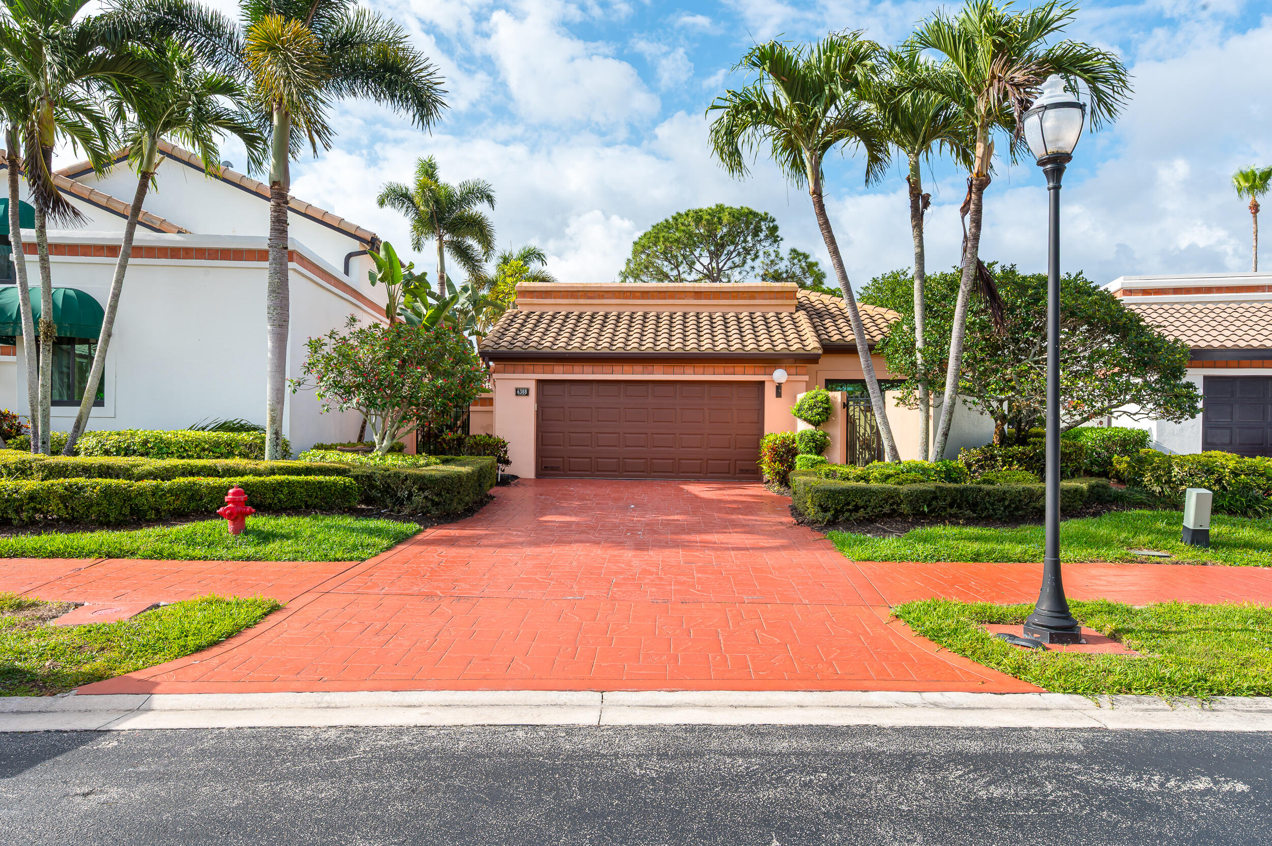 6388 Via Rosa Boca Raton, FL 33433 - Photo 48 of 49 a front view of a house with garden