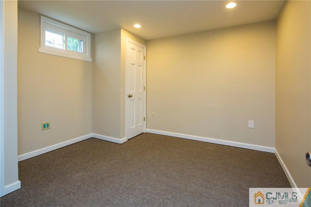26 Purdue Road Old Bridge, NJ 08859 - Photo 18 of 21 an empty room with windows