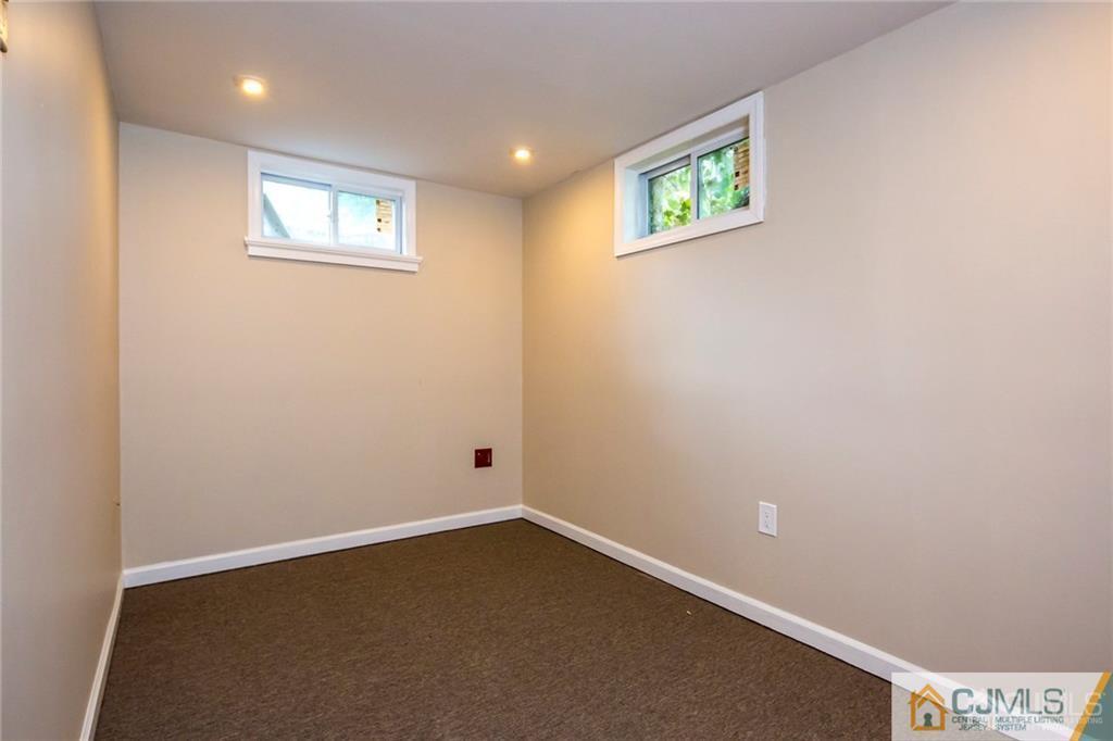 26 Purdue Road Old Bridge, NJ 08859 - Photo 20 of 21 an empty room with windows