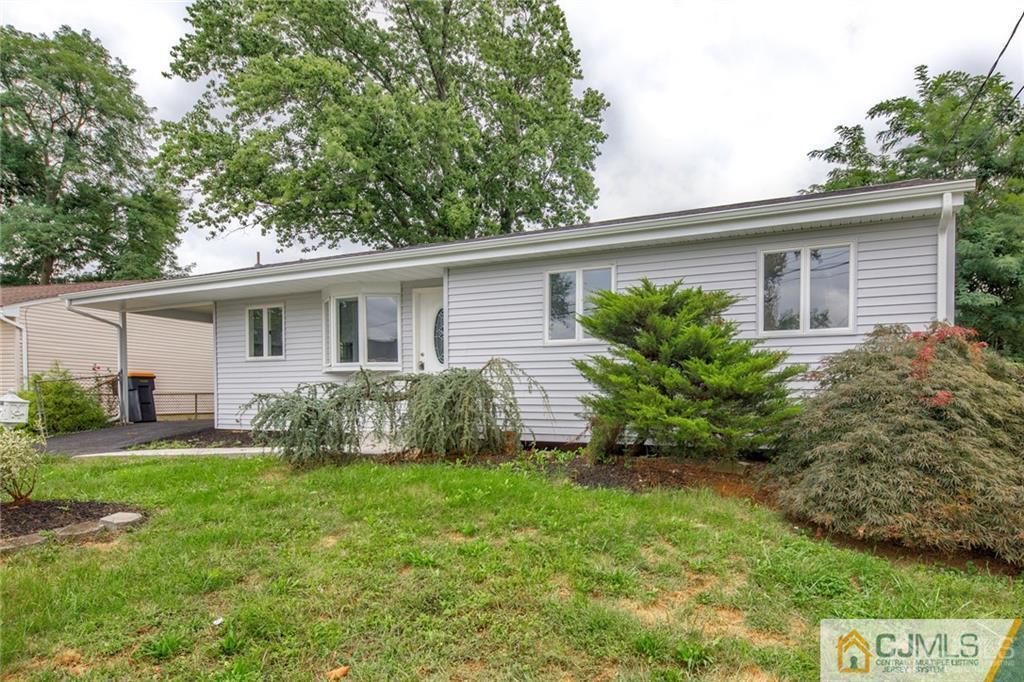 26 Purdue Road Old Bridge, NJ 08859 - Photo 2 of 21 a front view of house with yard and green space