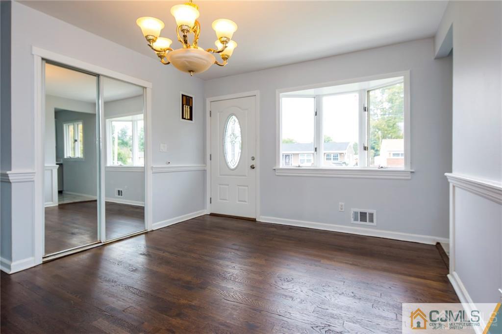 26 Purdue Road Old Bridge, NJ 08859 - Photo 6 of 21 a view of an empty room with wooden floor and a window