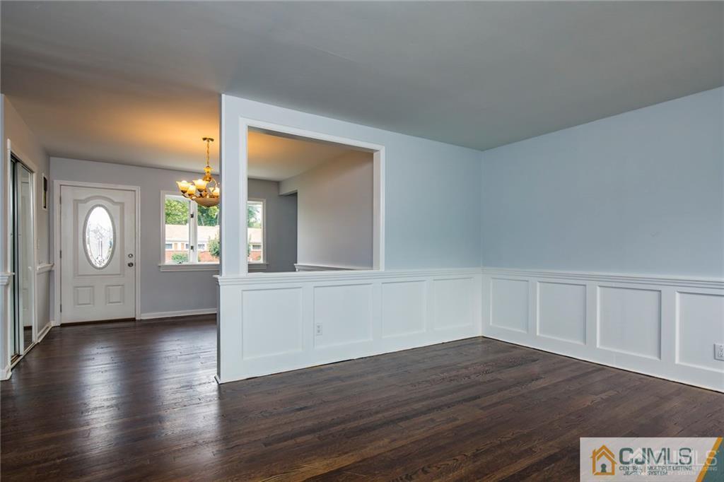 26 Purdue Road Old Bridge, NJ 08859 - Photo 8 of 21 a view of an empty room with wooden floor and a window