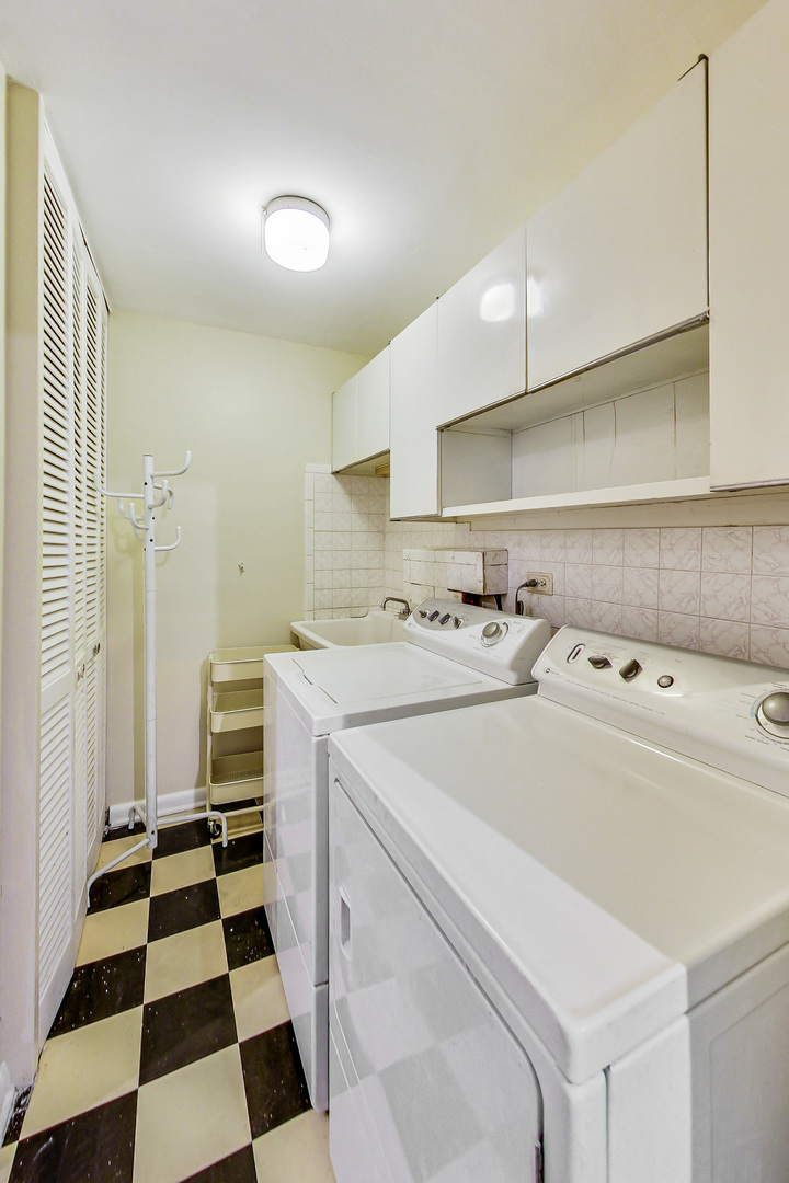 1604 Oakton Street Park Ridge, IL 60068 - Photo 18 of 23 a utility room with dryer and washer
