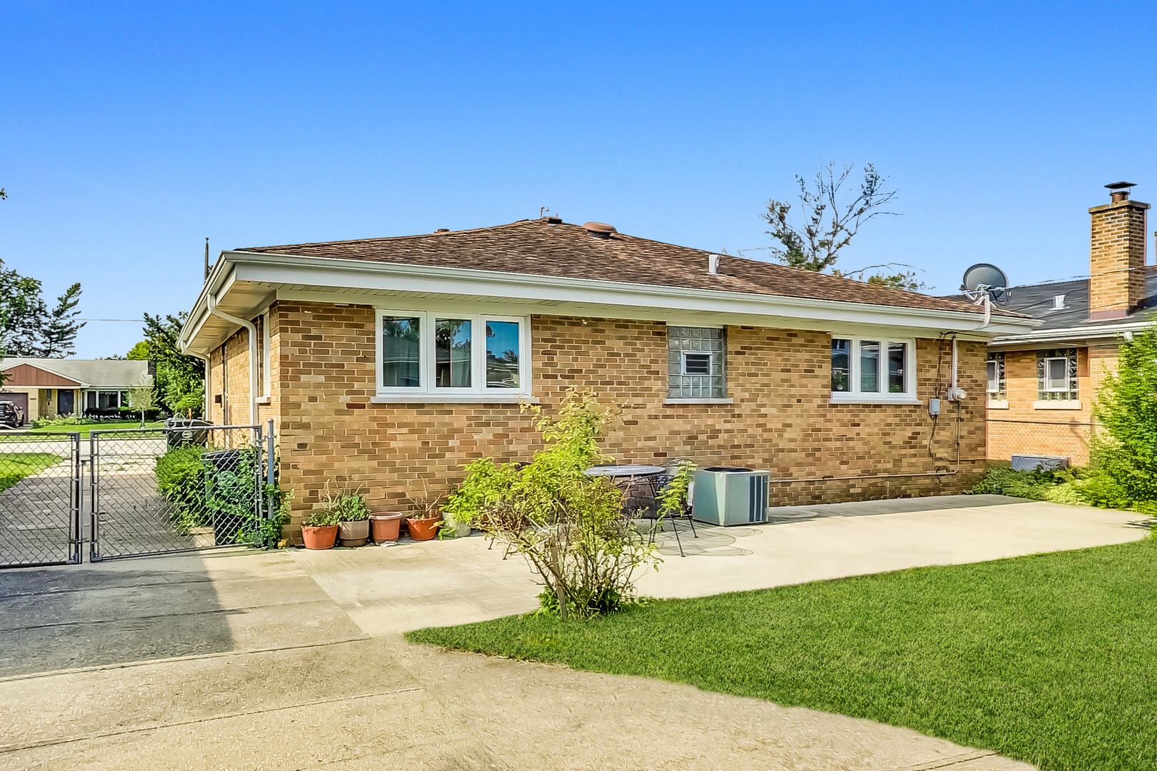 1604 Oakton Street Park Ridge, IL 60068 - Photo 19 of 23 a front view of a house with a yard