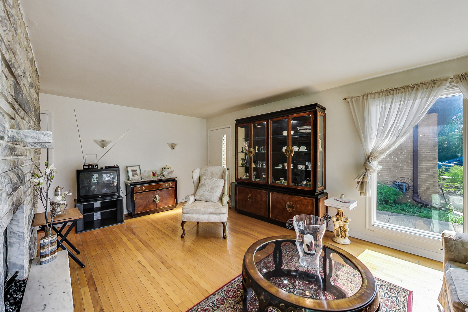 1604 Oakton Street Park Ridge, IL 60068 - Photo 3 of 23 a living room with furniture and a wooden floor