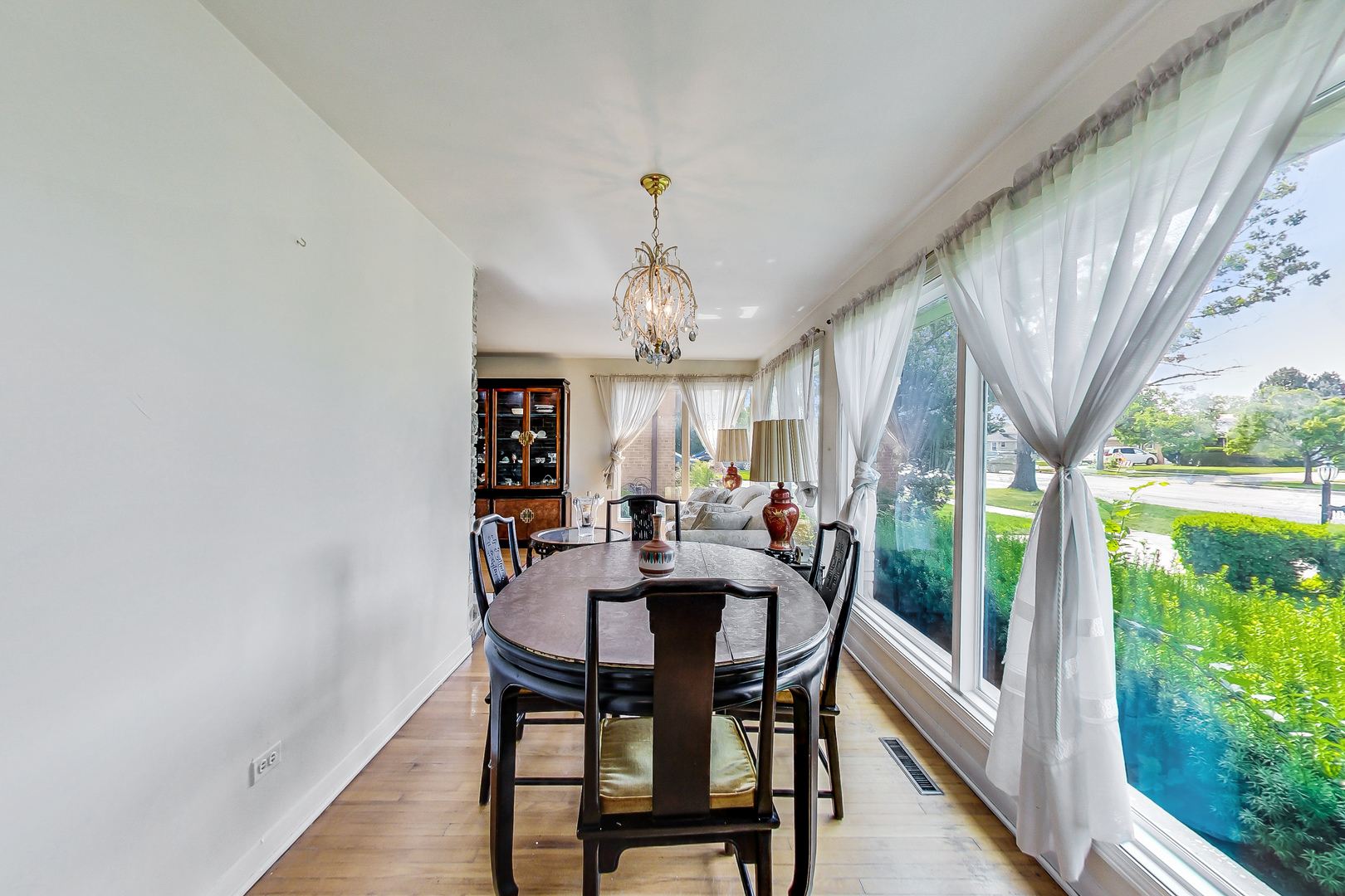 1604 Oakton Street Park Ridge, IL 60068 - Photo 4 of 23 a view of a dining room with furniture window and outside view
