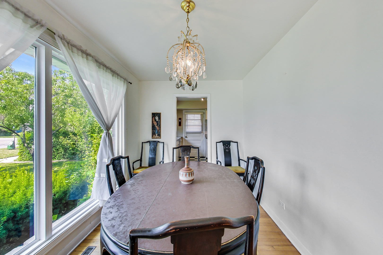 1604 Oakton Street Park Ridge, IL 60068 - Photo 5 of 23 a view of a dining room with furniture window and outside view