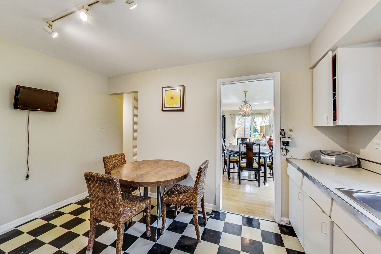 1604 Oakton Street Park Ridge, IL 60068 - Photo 9 of 23 a view of a dining room with furniture and wooden floor