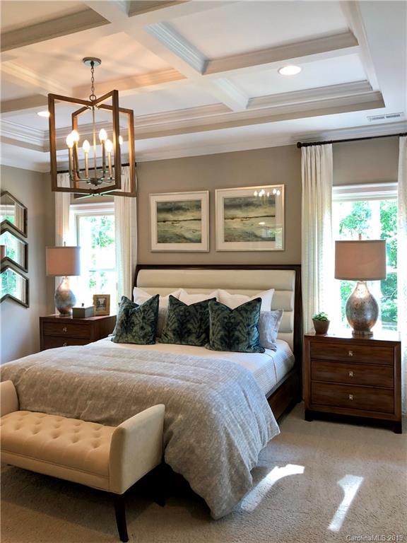 1392 Afton Way, Unit 147 Fort Mill, SC 29708 - Photo 16 of 28 a bedroom with a bed window and couch