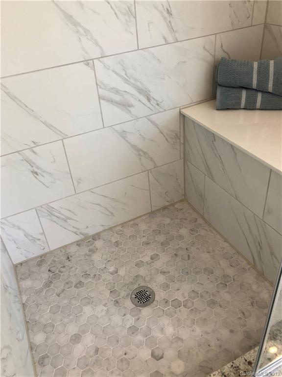 1392 Afton Way, Unit 147 Fort Mill, SC 29708 - Photo 26 of 28 a bathroom with a bathtub