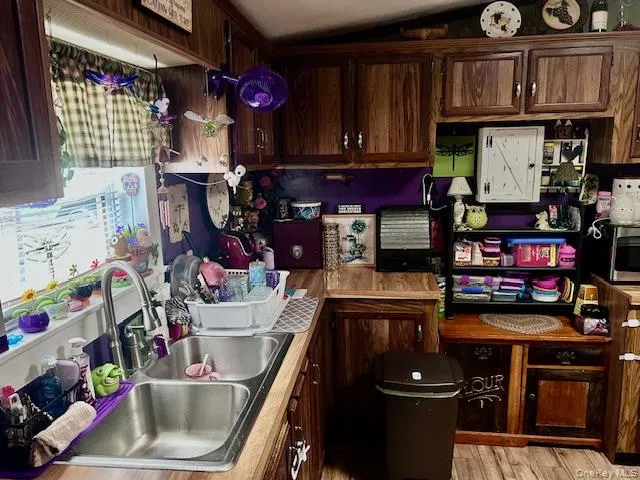 a dining room with furniture and rug
