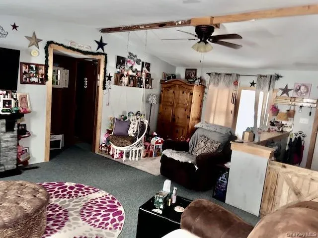 a kitchen with stainless steel appliances granite countertop a stove a sink dishwasher and cabinets with wooden floor