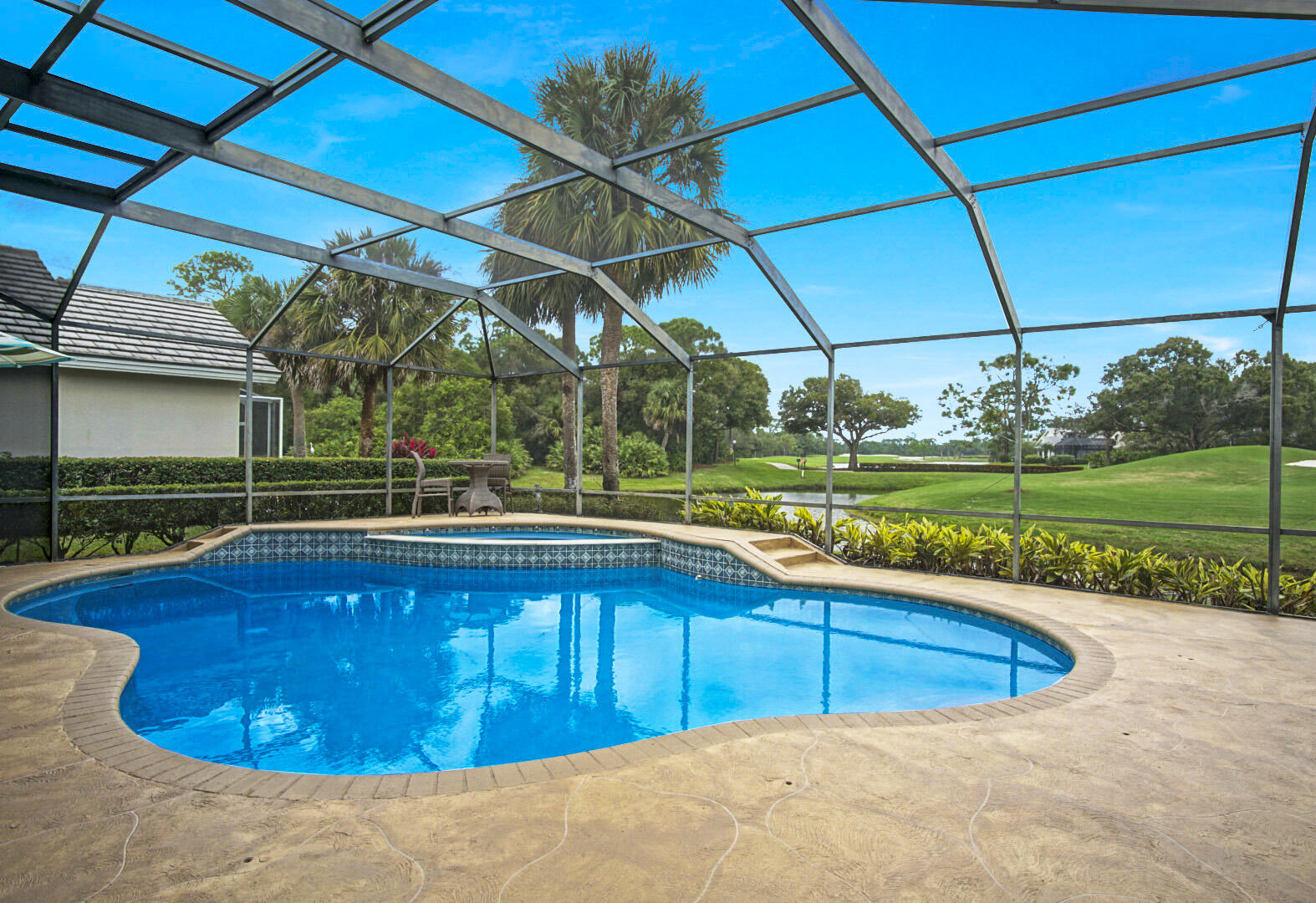 10324 Inverness Way Port St. Lucie, FL 34986 - Photo 33 of 70 Pool to long golf view