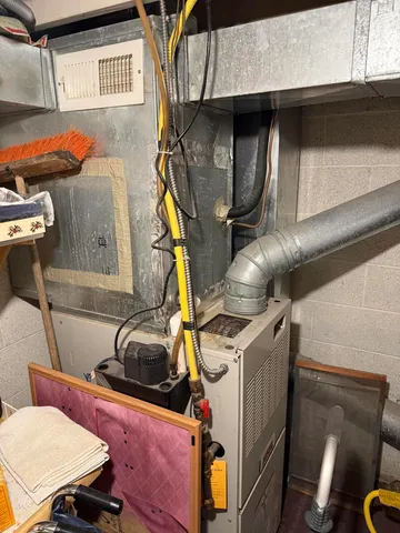 a view of storage and utility room with a sink
