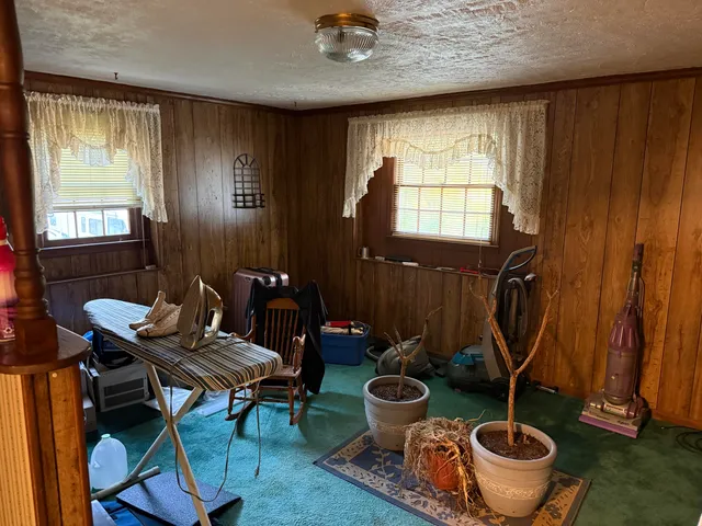 a kitchen with a stove and a refrigerator