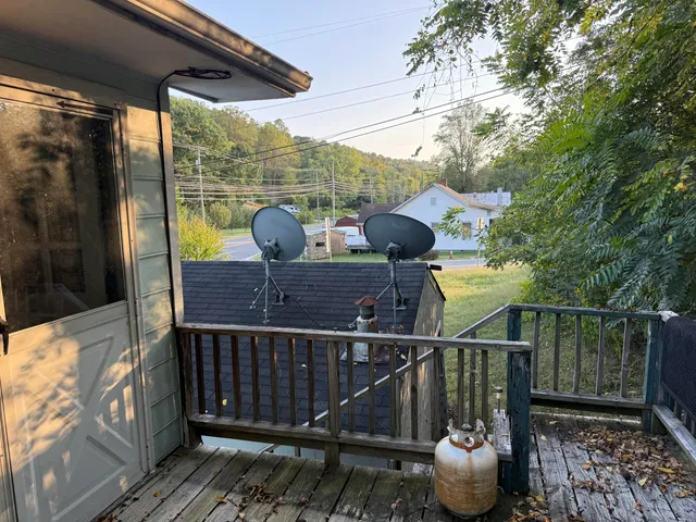 a view of a balcony with chair