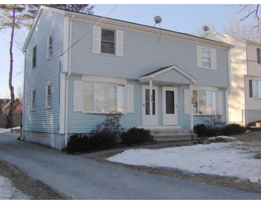 149-151 Verge Street Springfield, MA 01129 - Photo 1 of 1 a front view of a house with a yard