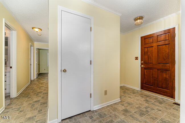 6693 Silk Hope Liberty Road Siler City, NC 27344 - Photo 6 of 32 a view of a hallway with closet area