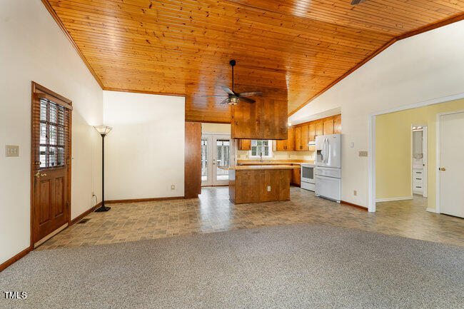 6693 Silk Hope Liberty Road Siler City, NC 27344 - Photo 10 of 32 a view of a livingroom with wooden floor