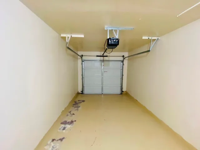 a view of storage and utility room with utility room