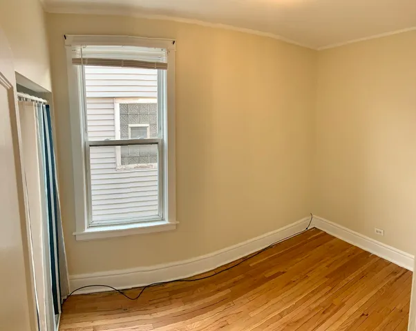 a view of a room that has a window in it