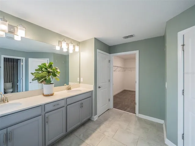 a view of a kitchen and a sink