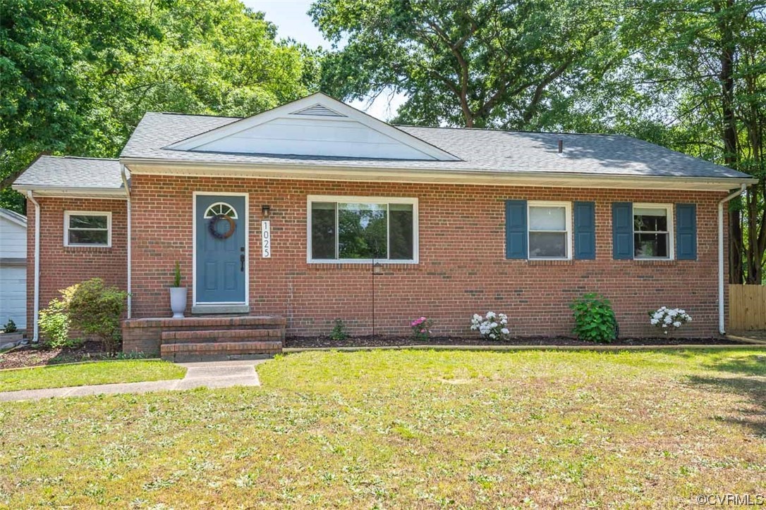 1025 Andros Road Richmond, VA 23225 - Photo 1 of 37 a front view of a house with a yard