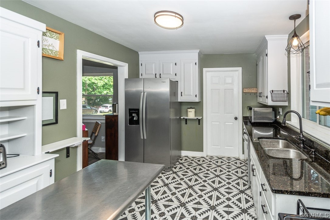 1025 Andros Road Richmond, VA 23225 - Photo 13 of 37 a kitchen with stainless steel appliances granite countertop a refrigerator and a sink