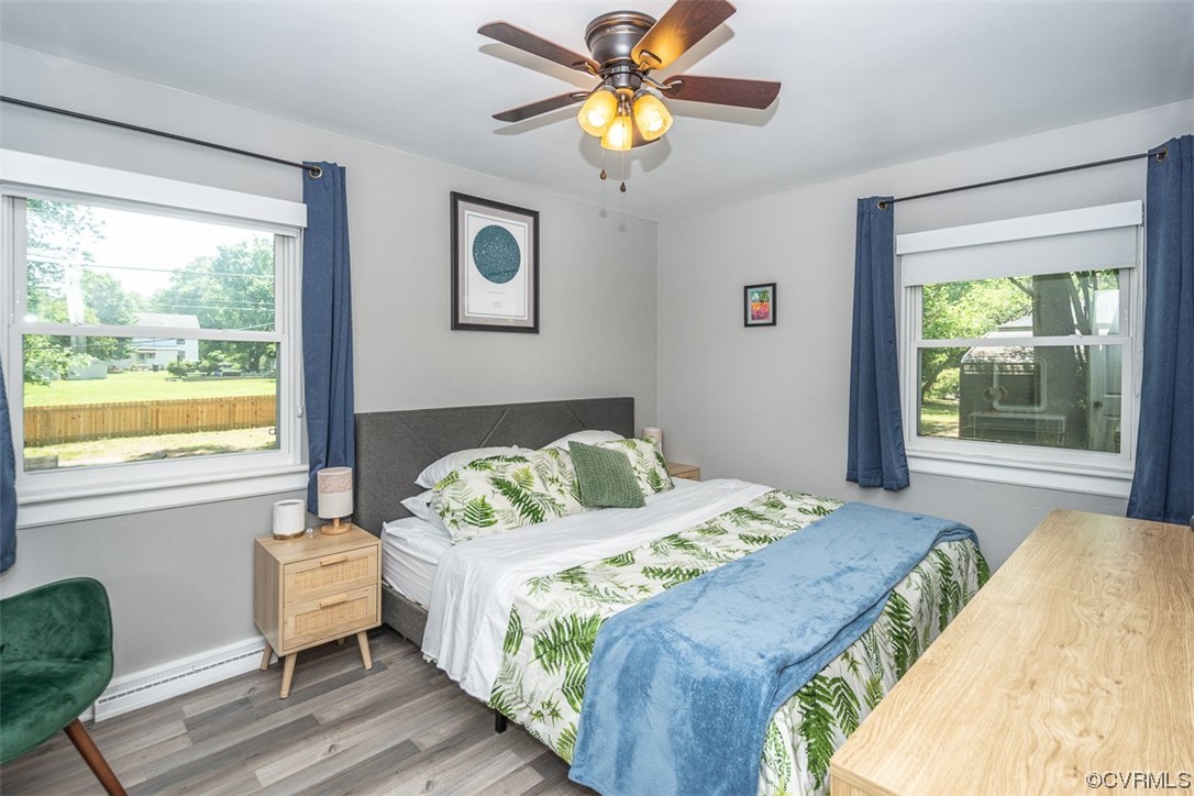 1025 Andros Road Richmond, VA 23225 - Photo 15 of 37 a bedroom with a bed dresser and a window