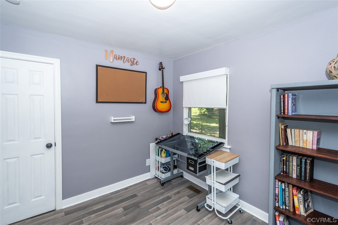 1025 Andros Road Richmond, VA 23225 - Photo 23 of 37 a room with furniture and book shelf
