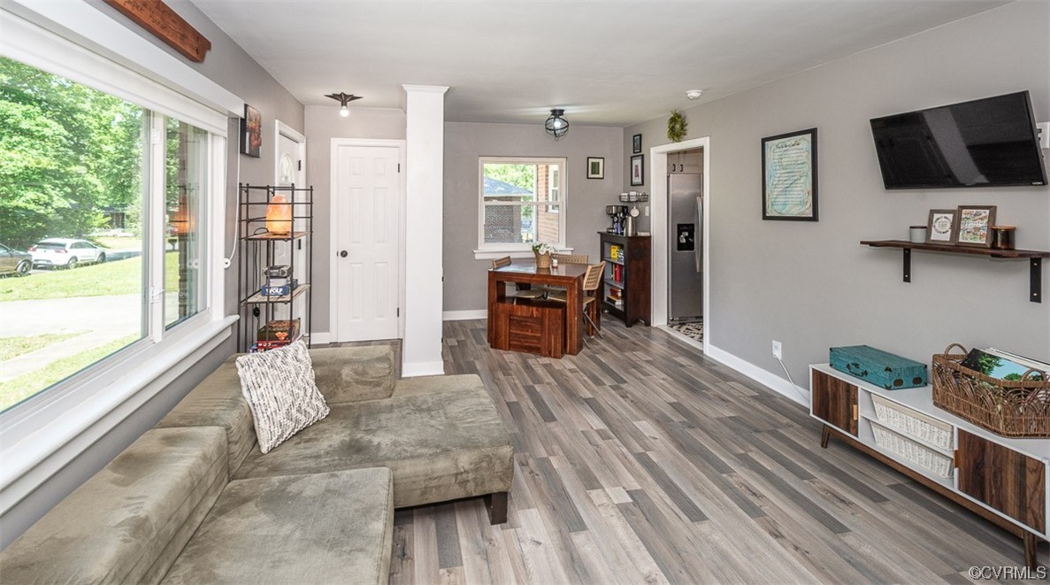 1025 Andros Road Richmond, VA 23225 - Photo 8 of 37 a living room with furniture and a flat screen tv
